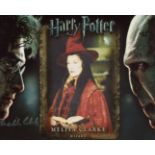 Harry Potter. 8x10 Harry Potter movie photo signed by actress Melita Clarke as a Wizard. All