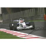 Robert Kubica signed 12x8 colour photo racing for BMW in 2007. Robert is one the best drivers to