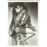 Lenny Kravitz signed 6x4 black and white postcard. All autographs come with a Certificate of