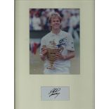 Stefan Edberg. Signature mounted with Wimbledon picture. Professionally mounted to 16x12 and framed.