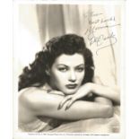 Yvonne DeCarlo sexy signed 10 x 8 inch b/w vintage photo to Tom. Condition 5/10. All autographs come