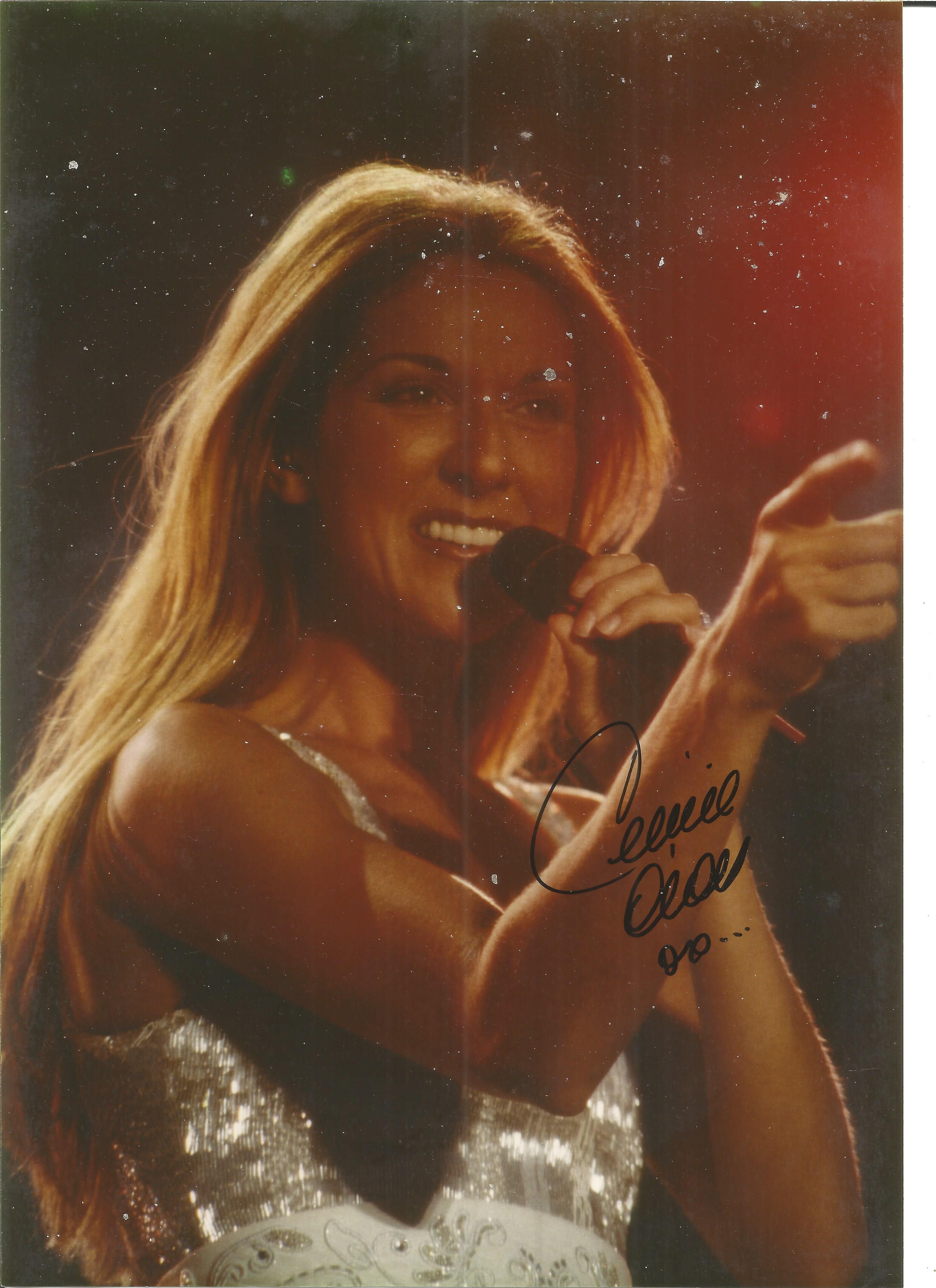 Celine Dion signed 11x8 colour photo. All autographs come with a Certificate of Authenticity. We