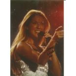 Celine Dion signed 11x8 colour photo. All autographs come with a Certificate of Authenticity. We