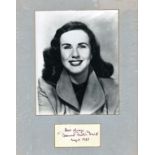 Deanna Durbin signature piece mounted below black and white photo. Approx overall size 14x12. All