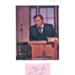 Robert Mitcham signature piece mounted below colour photo. Approx overall size 14x10. All autographs
