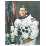 Space Astronaut William Pogue signed 10x8 colour spacesuit photo. All autographs come with a