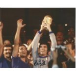 Dino Zoff signed 10x8 colour photo holding the World cup aloft. All autographs come with a