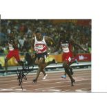 Athletics Zharnel Hughes 10x8 signed colour photo pictured in action at the Commonwealth Games.