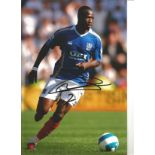 John Utaka Portsmouth Signed 12 x 8 inch football photo. All autographs come with a Certificate of