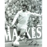 Football Paul Reaney 10x8 signed black and white photo pictured in action for Leeds United. All