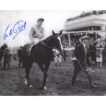 Lester Piggott. 8x10 inch photo signed by legendary jockey Lester Piggott pictured sitting on