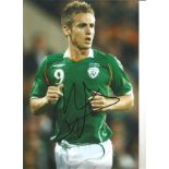 Kevin Doyle Ireland Signed 12 x 8 inch football photo. All autographs come with a Certificate of