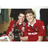 Steve Bruce and Lee Sharpe Man United Signed 12 x 8 inch football colour photo. All autographs