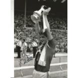 Norman Whiteside Man United Signed 12 x 8 inch football photo. All autographs come with a