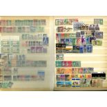 Worldwide stamp collection 16 pages of stamps housed in blue stock book countries include Canada,