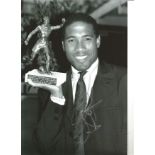 John Barnes Liverpool Signed 12 x 8 inch football photo. All autographs come with a Certificate of