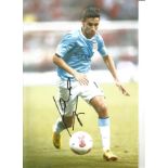 Jesús Navas Manchester City Signed 12 x 8 inch football photo. All autographs come with a
