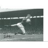 Alex Stepney Man United Signed 10 x 8 inch football black and white photo. All autographs come