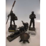 A 20th century bronze figure of an oarsman, another similar and other items