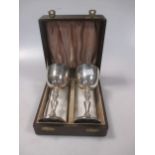 A pair of silver goblets