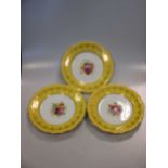 A set of 8 Royal Worcester plates, decorated with central spray of flowers