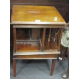 An Edwardian mahogany and satinwood cross banded square revolving bookcase, 62 x 45 x 45cm