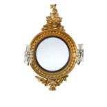 A Regency gilt framed convex wall mirror,