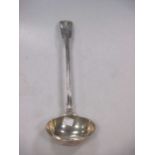 A Victorian silver soup ladle