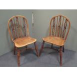 A pair of early 19th century yewood and elm kitchen chairs with crinoline stretchers (2)