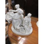 A 19th century bisque porcelain group of three classily dressed ladies, together with putti standing