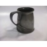 A Tudric pewter pint mug, Liberty. Probably to a design by Archibald Knox.