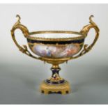 A late 19th century porcelain and gilt metal mounted two-handled pedestal bowl,