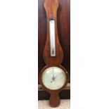 An 19th century mahogany wheel barometer,