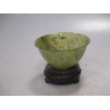 A jade bowl on stand