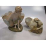 A Royal Vienna porcelain figure of a boy dragging a shell and another
