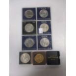 A quantity of misc coins including some silver.
