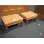 A pair of Victorian rectangular foot stools with buttoned rouge upholstery, on turned legs (2)