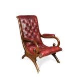 A Regency mahogany x-framed library armchair,