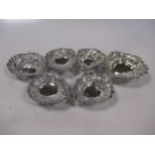 Six silver pierced pin trays, two silver bowls and a silver jug, 9.7ozt gross (Qty: 9)