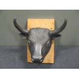A cast iron bull's head