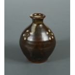 § Bernard Leach (British, 1887-1979), a miniature stoneware vase,