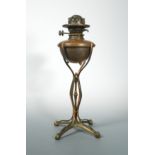 A W.A.S Benson brass and copper oil lamp,