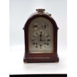 An early 20th century mahogany mantle clock with westminster chime