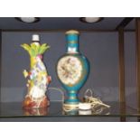 A Chinoiserie porcelain figural table lamp, 30cm high; a continental porcelain pedestal vase,