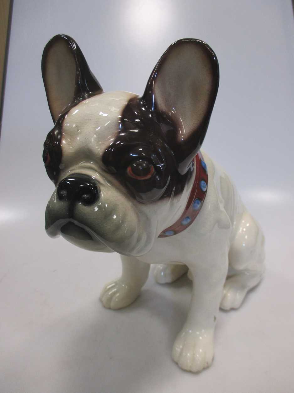 An Austrian Wiener Kunstkeramische Werkstätten pottery bull dog (restored)