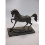 J L de Casasola a bronze horse on black marble base, 26cm high