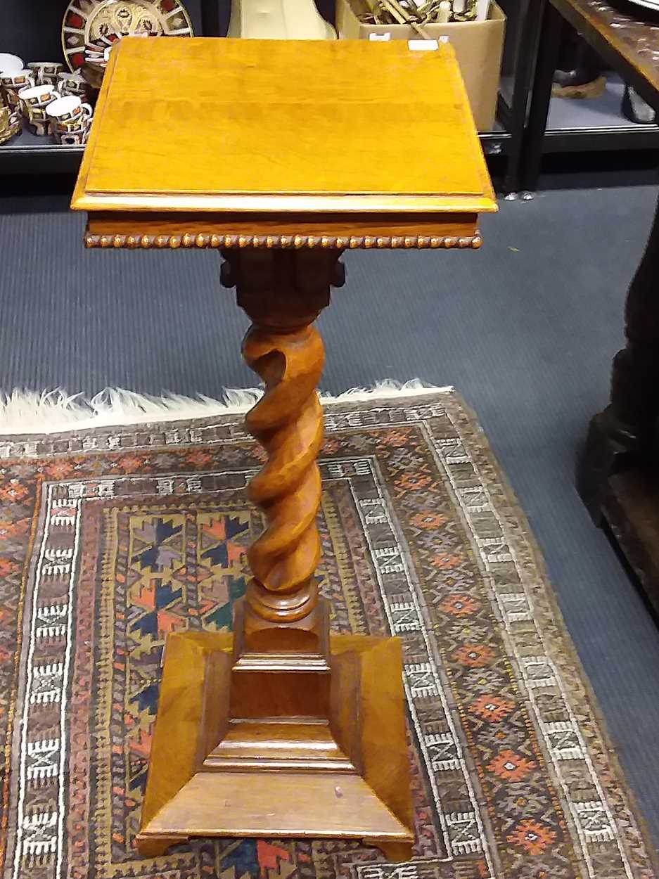 An early 20th century jardinière stand on barley twist support 83cm
