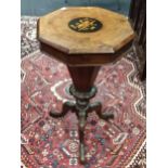 A Victorian walnut octagon sewing table 43cm diameter
