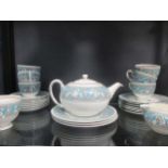 A Wedgwood Florentine tea service and a George Jones tea service and 4 cauldron floral plates (