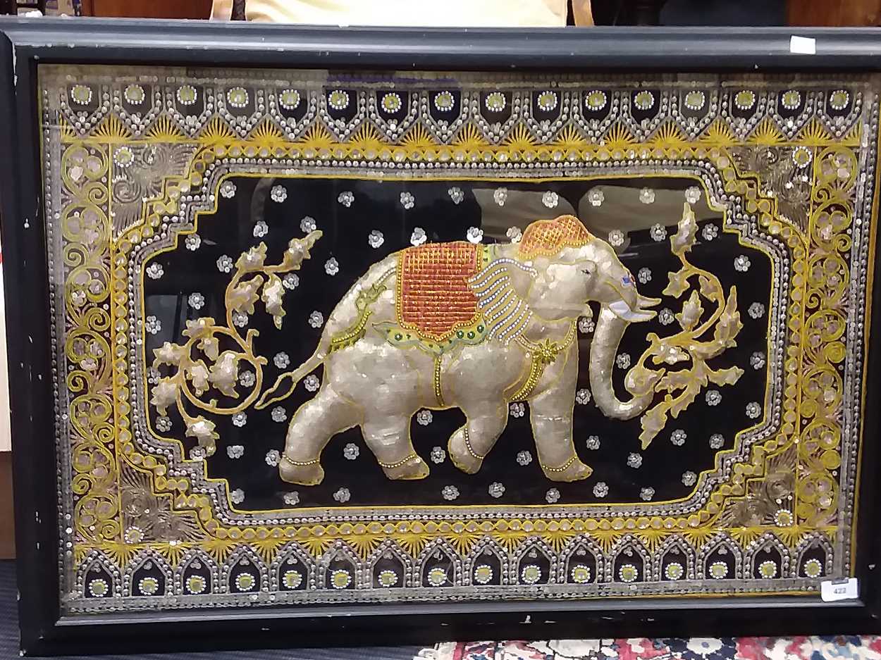 An Indian raised embroidery elephant picture on a dark ground, with silvered and gilt thread,